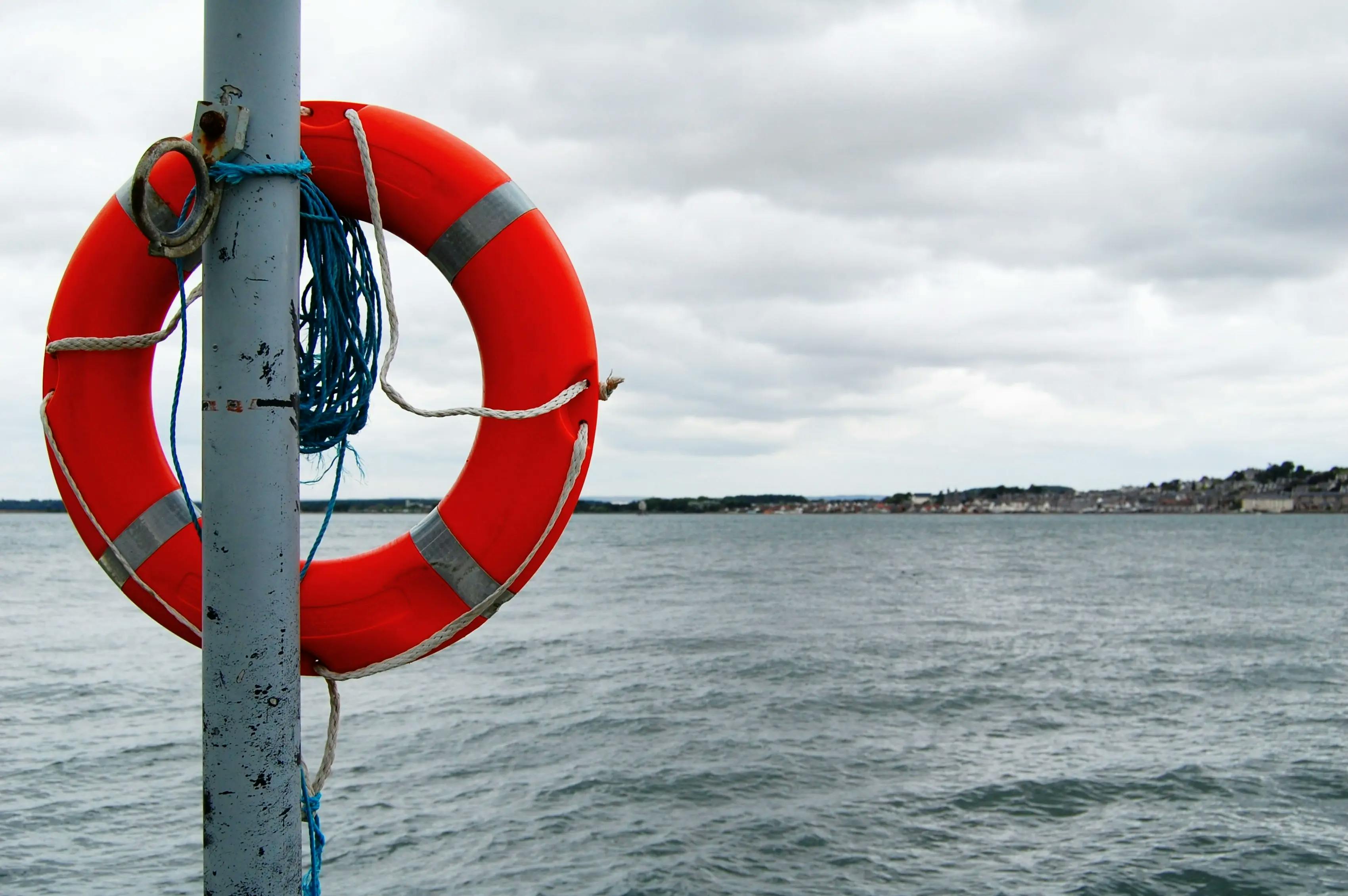 Pole with lifebuoy